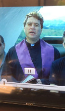 Mauricio Arce Lara as catholic priest in a movie